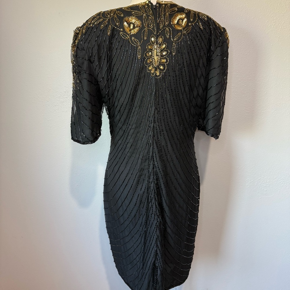 Elegant Black and Gold Embellished Dress - Picture 3 of 11